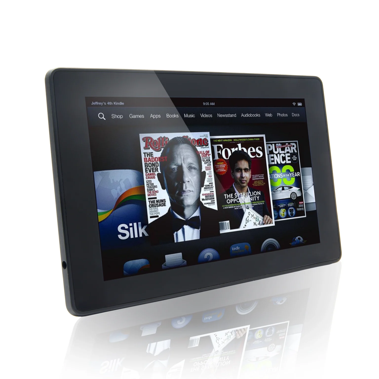Amazon Kindle Fire HD tablet displaying home screen with digital magazine covers on a white background