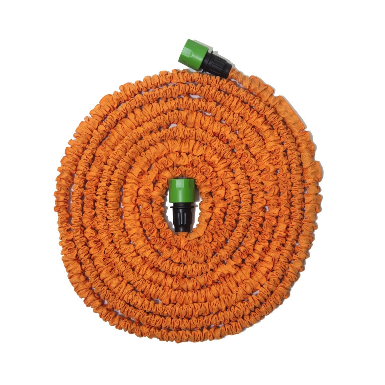 Coiled orange expandable garden hose with green connectors on a white background