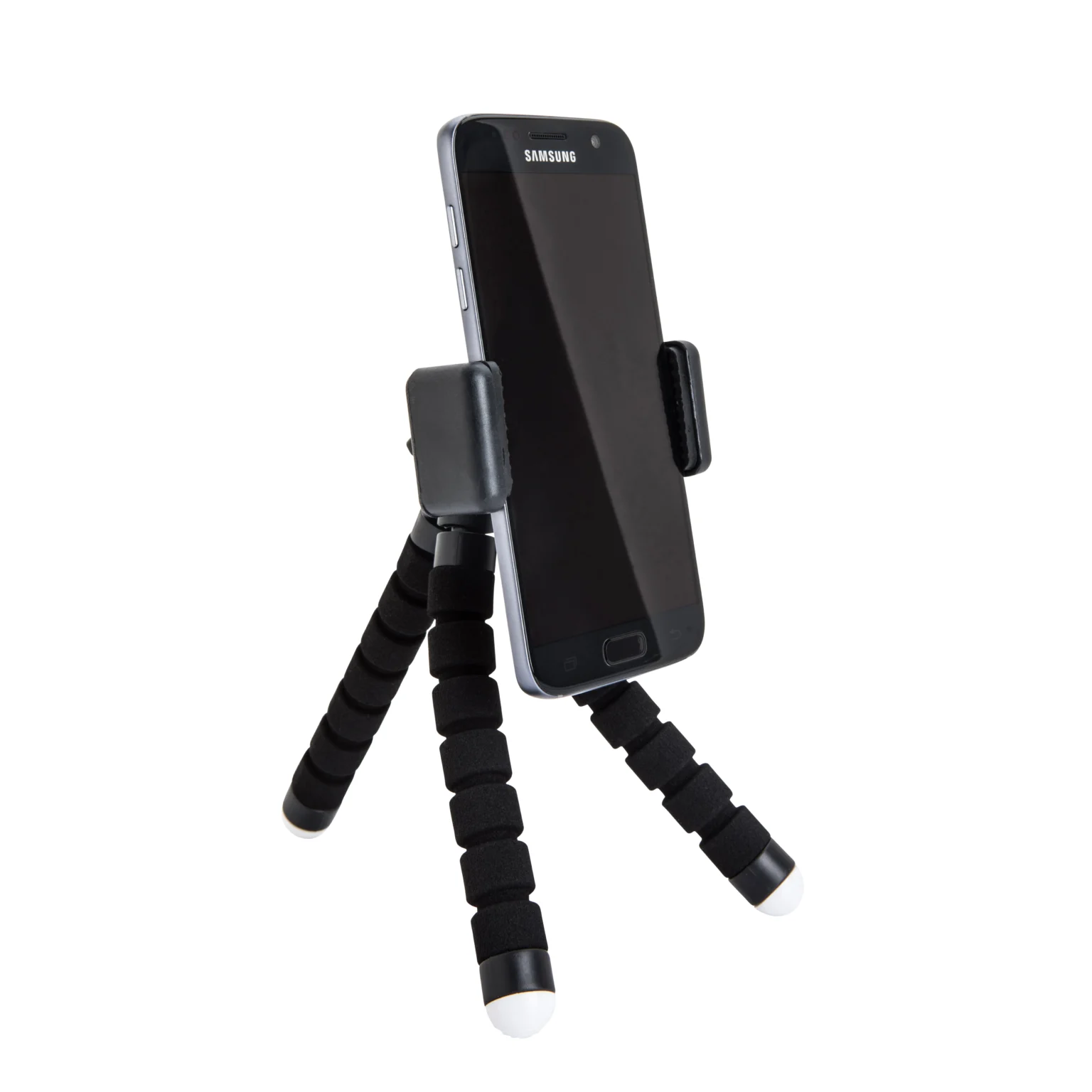 Flexible black foam tripod stand holding a smartphone on a white background